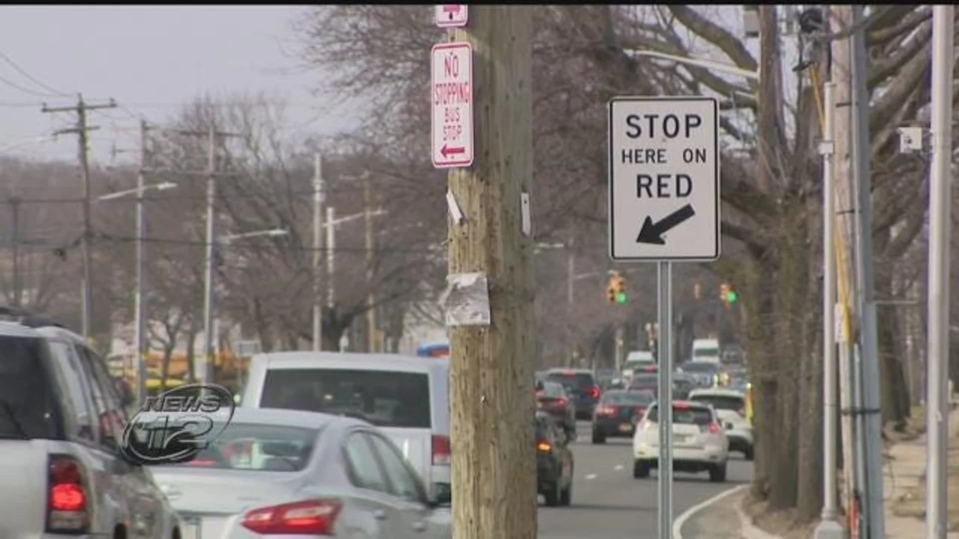 Residents, lawmakers slam Nassau for failing to install red-light camera signs