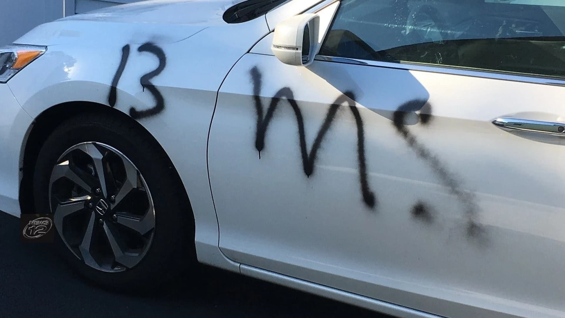 'MS 13' gang tag defaces cars, fence in Hicksville